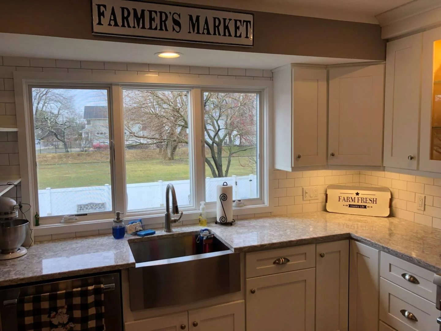 Farmer's Market printed on a board in a kitchen