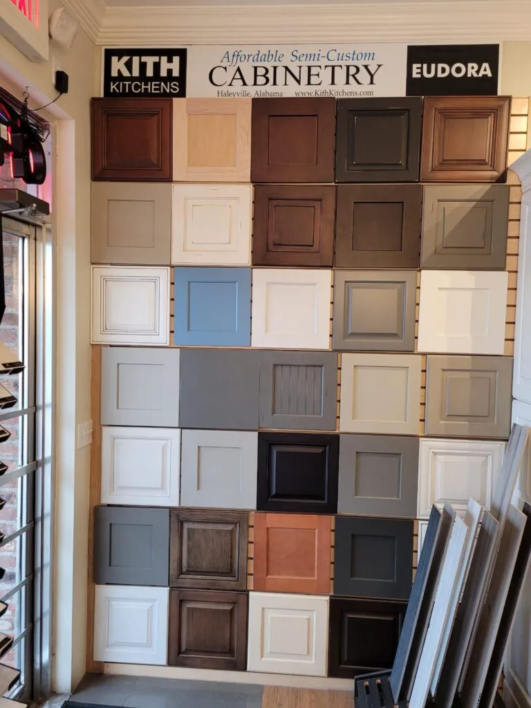 A wall of cabinets with different colors and sizes.